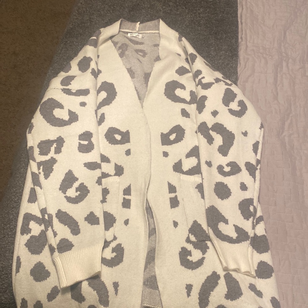 Mid length Leopard sweater size large.